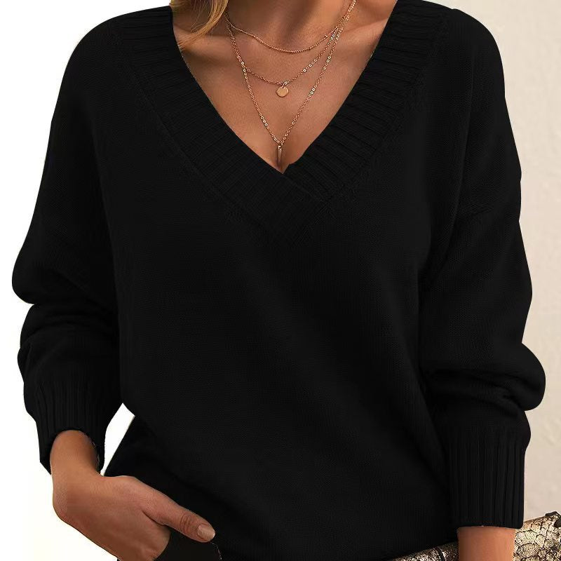 Frida | Ensfarvet V-hals Sweater – Løs Modestrikning