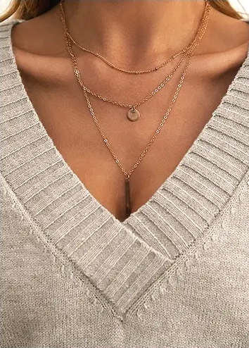 Frida | Ensfarvet V-hals Sweater – Løs Modestrikning